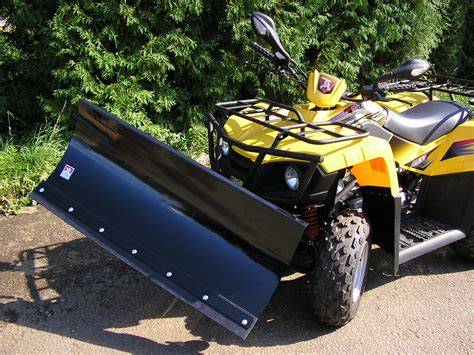 ATV radlice při odklízení sněhu