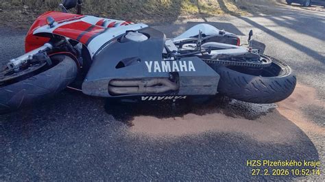 motorkář s protézou a upraveným motocyklem