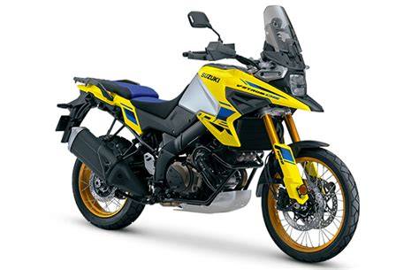 Bílá Suzuki V-Strom cestovní motocykl