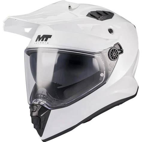 čistě bílá enduro helma na motocyklu