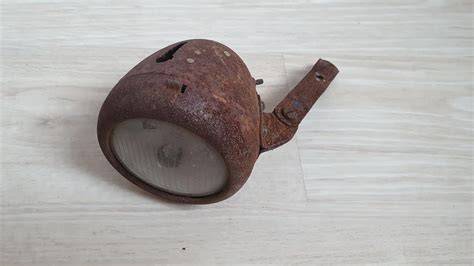 historické motokolo s karbidovou lampou